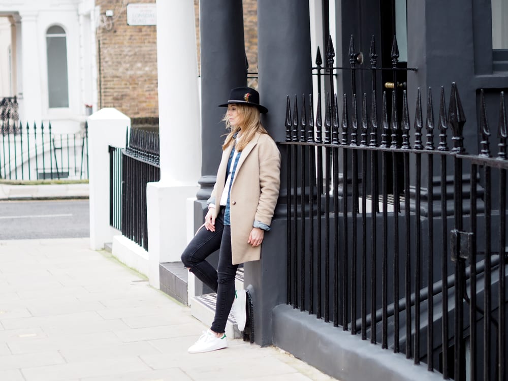 Style&Minimalism | It's Personal | Essential Spring Layers | Wearing Finders Keepers White Shirt, Wåven Denim Jacket, Camel Coat, Black Skinny Jeans, Black Fedora & Stan Smith Trainers