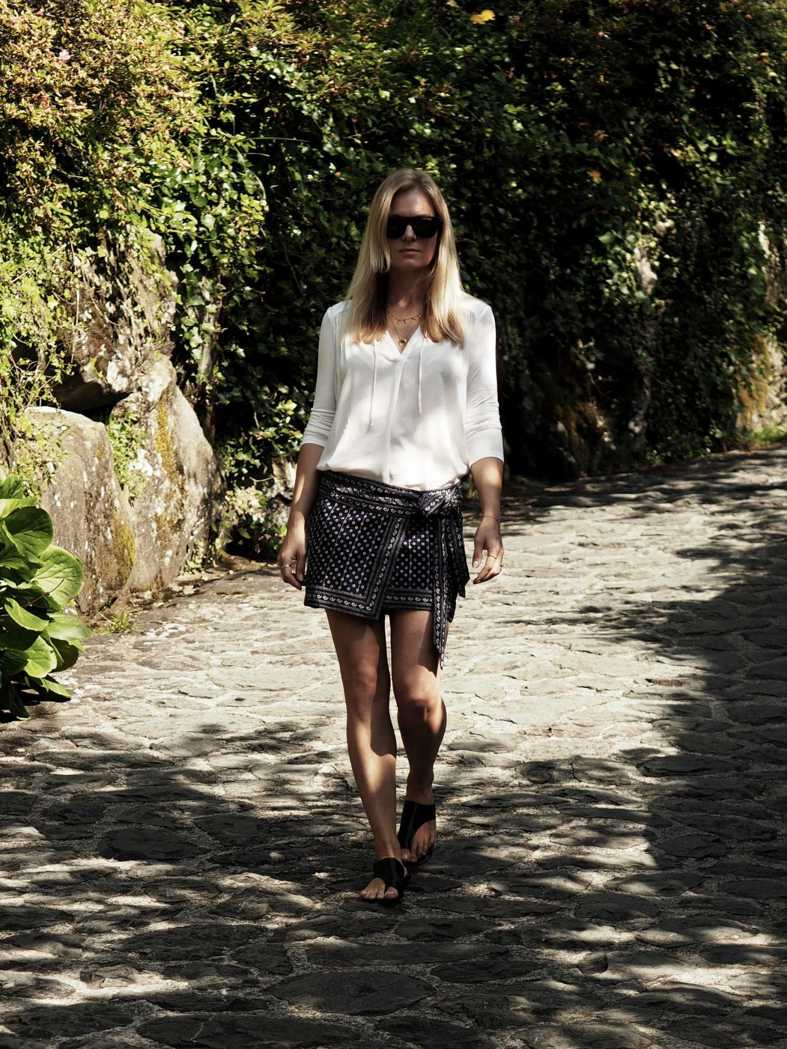 Style&Minimalism | It's Personal + Travel | Lucca | Wearing Splendid White Top, Isabel Marant Wrap Skirt, Retrosuperfuture Flat Top Sunglasses, ATP Atelier Rosa Sandals